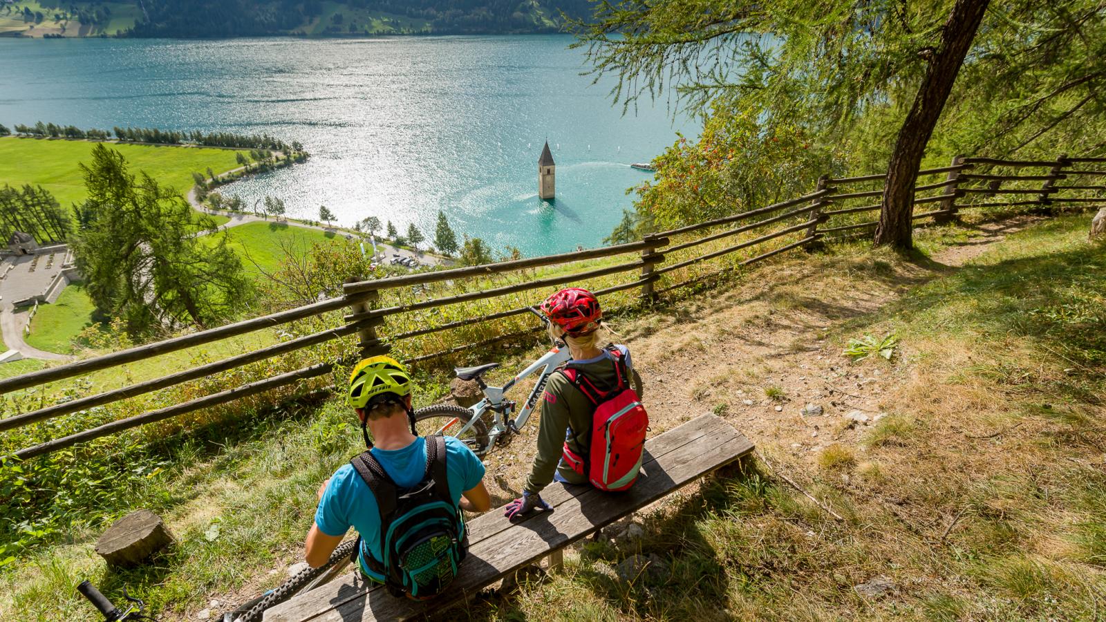 Mountain bike with a view on the Resia lake